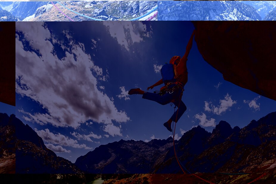 Ein Mann der bergsteigt und von einer Klippe hängt